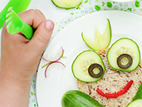 Child eating vegetables